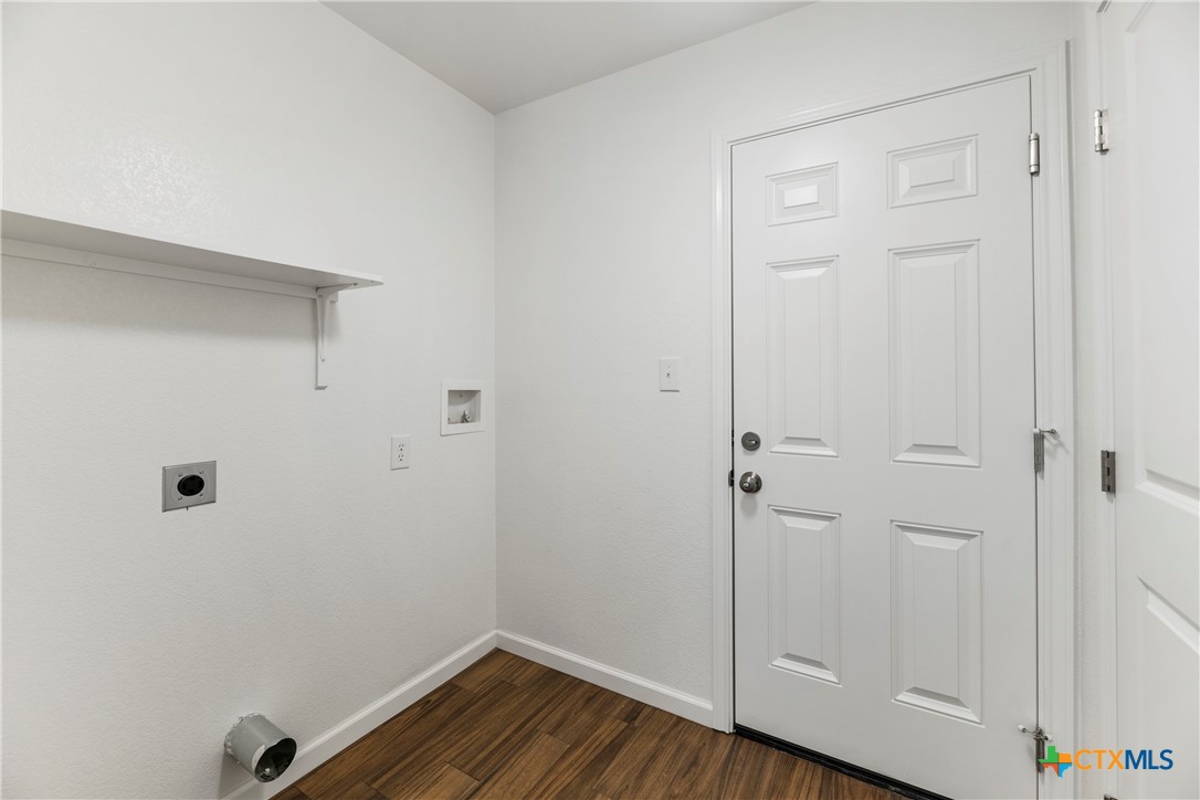 230 Plum Street Luling, TX 78648 - Photo 30 of 33 a view of small space with wooden floor