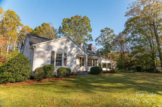 a front view of house with garden
