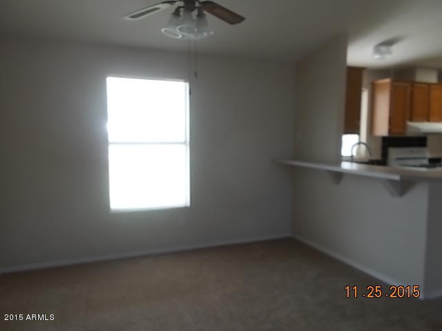 7125 West Nancy Road Peoria, AZ 85382 - Photo 12 of 39 an empty room with a window