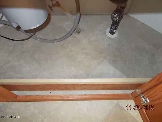 7125 West Nancy Road Peoria, AZ 85382 - Photo 18 of 39 a bathroom with a sink