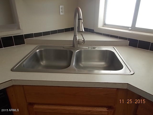 7125 West Nancy Road Peoria, AZ 85382 - Photo 20 of 39 a close view of sink and tap