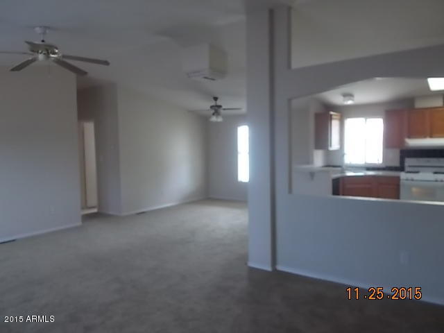 7125 West Nancy Road Peoria, AZ 85382 - Photo 24 of 39 an empty room with a empty space and windows