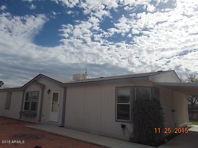7125 West Nancy Road Peoria, AZ 85382 - Photo 35 of 39 a front view of a house with garden