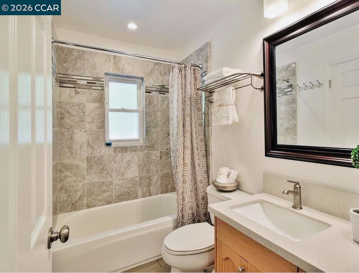 143 Pulido Road Danville, CA 94526 - Photo 16 of 27 a bathroom with a granite countertop sink toilet and shower