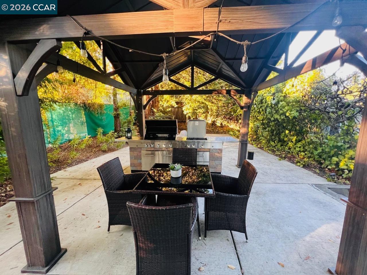 143 Pulido Road Danville, CA 94526 - Photo 27 of 27 a view of an outdoor sitting area with a table and chairs