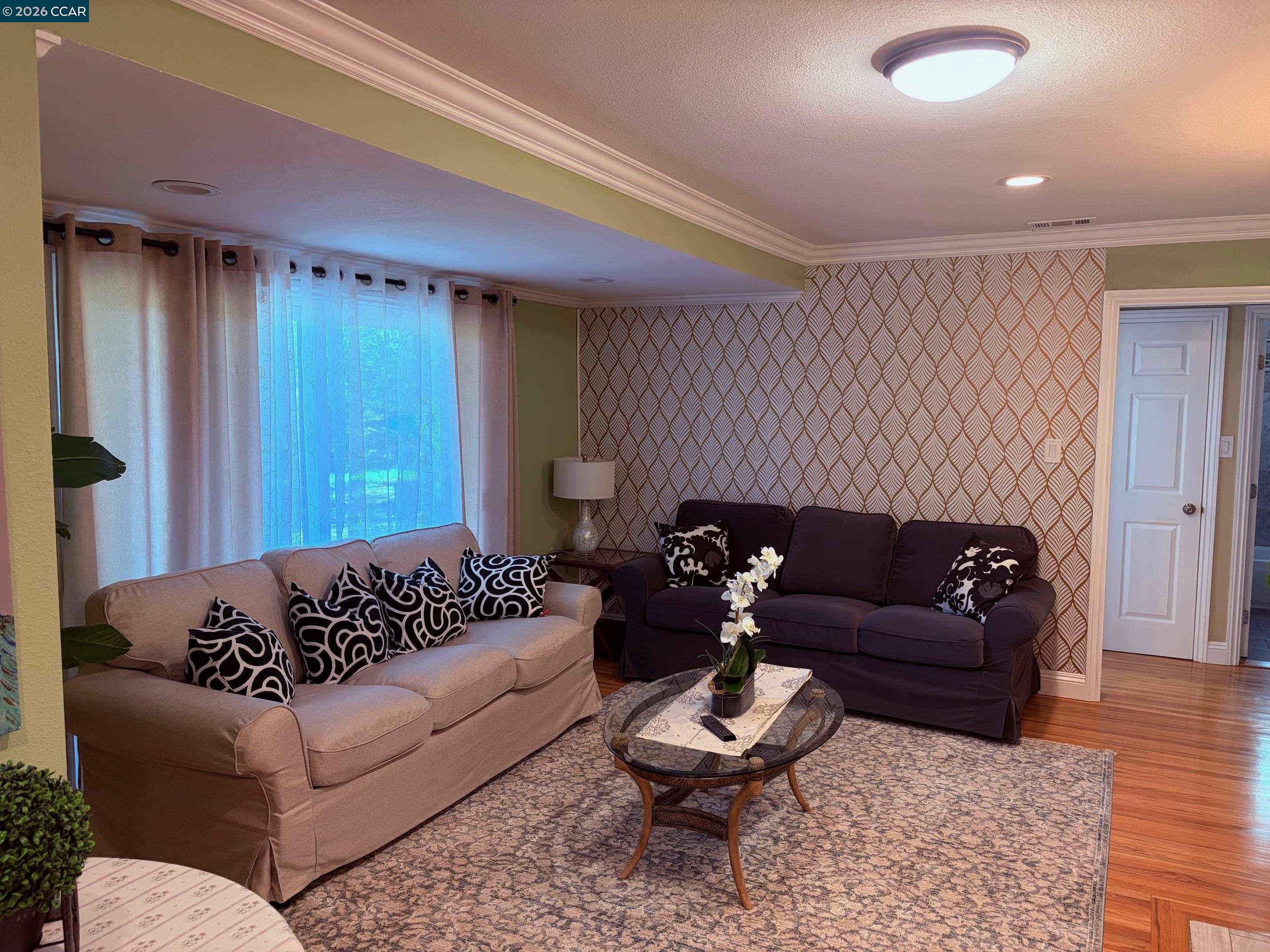 143 Pulido Road Danville, CA 94526 - Photo 7 of 27 a living room with furniture and a rug