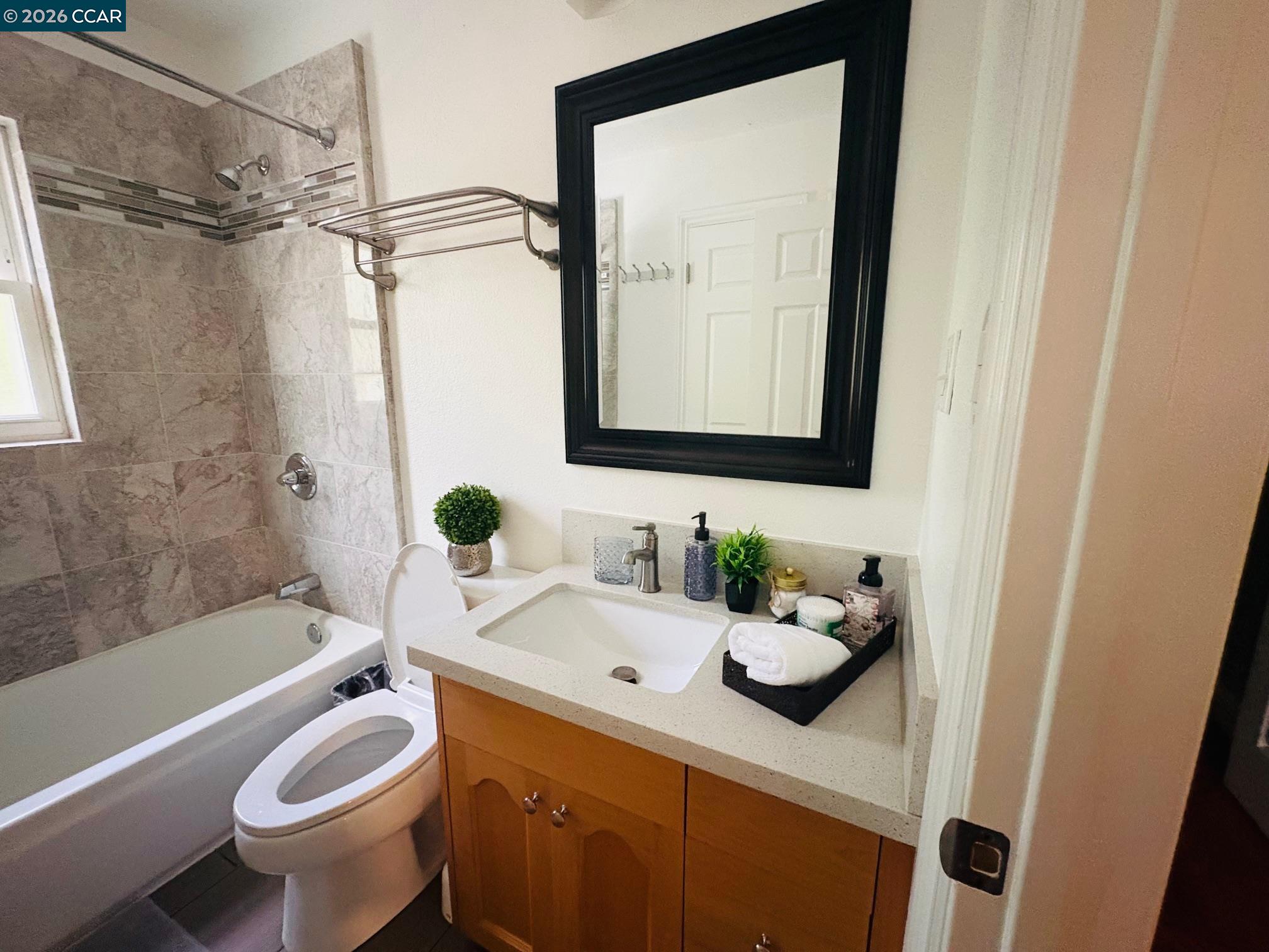 143 Pulido Road Danville, CA 94526 - Photo 9 of 27 a bathroom with a sink toilet and shower