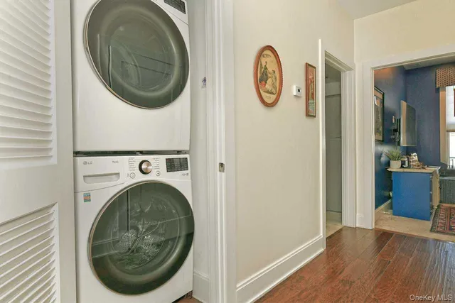 a view of a hallway with washer and dryer
