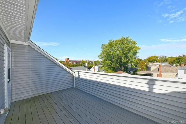 a view of a balcony with mountain view