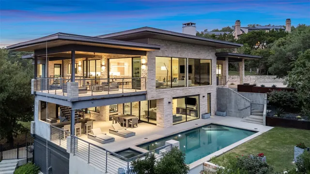 a view of house with a swimming pool