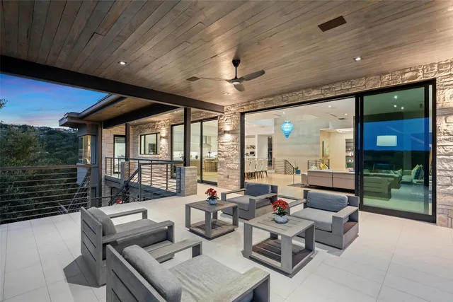 a outdoor space with patio the couches and a dining table with the garden view