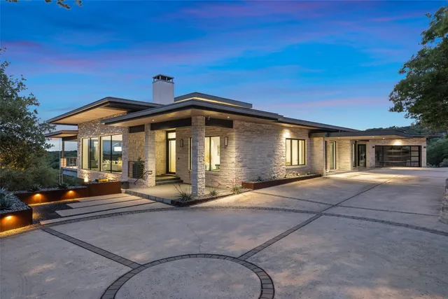 a front view of a house with yard