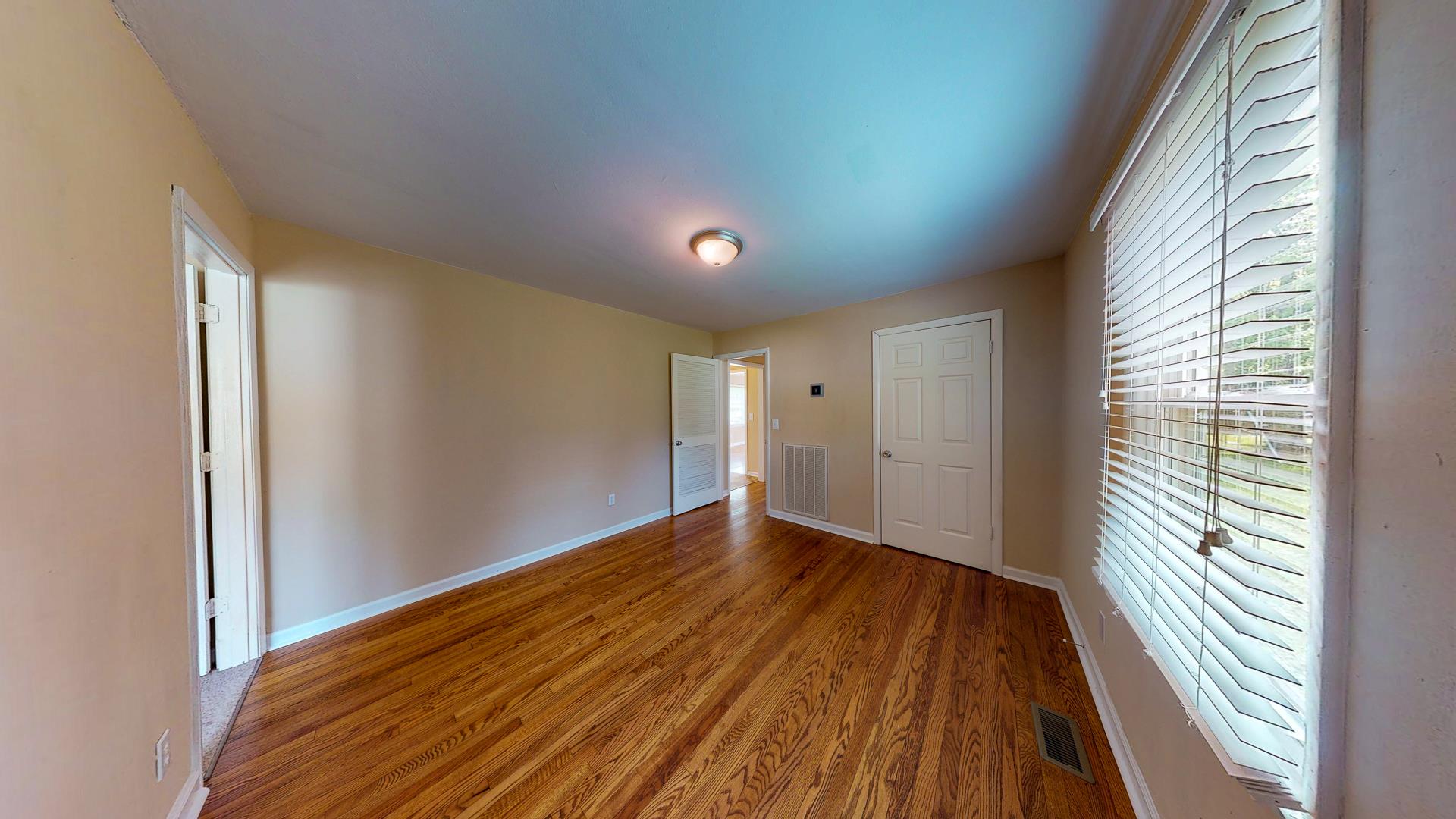 1236 Butler Bridge Road Portland, TN 37148 - Photo 14 of 22 a view of room with window and wooden floor