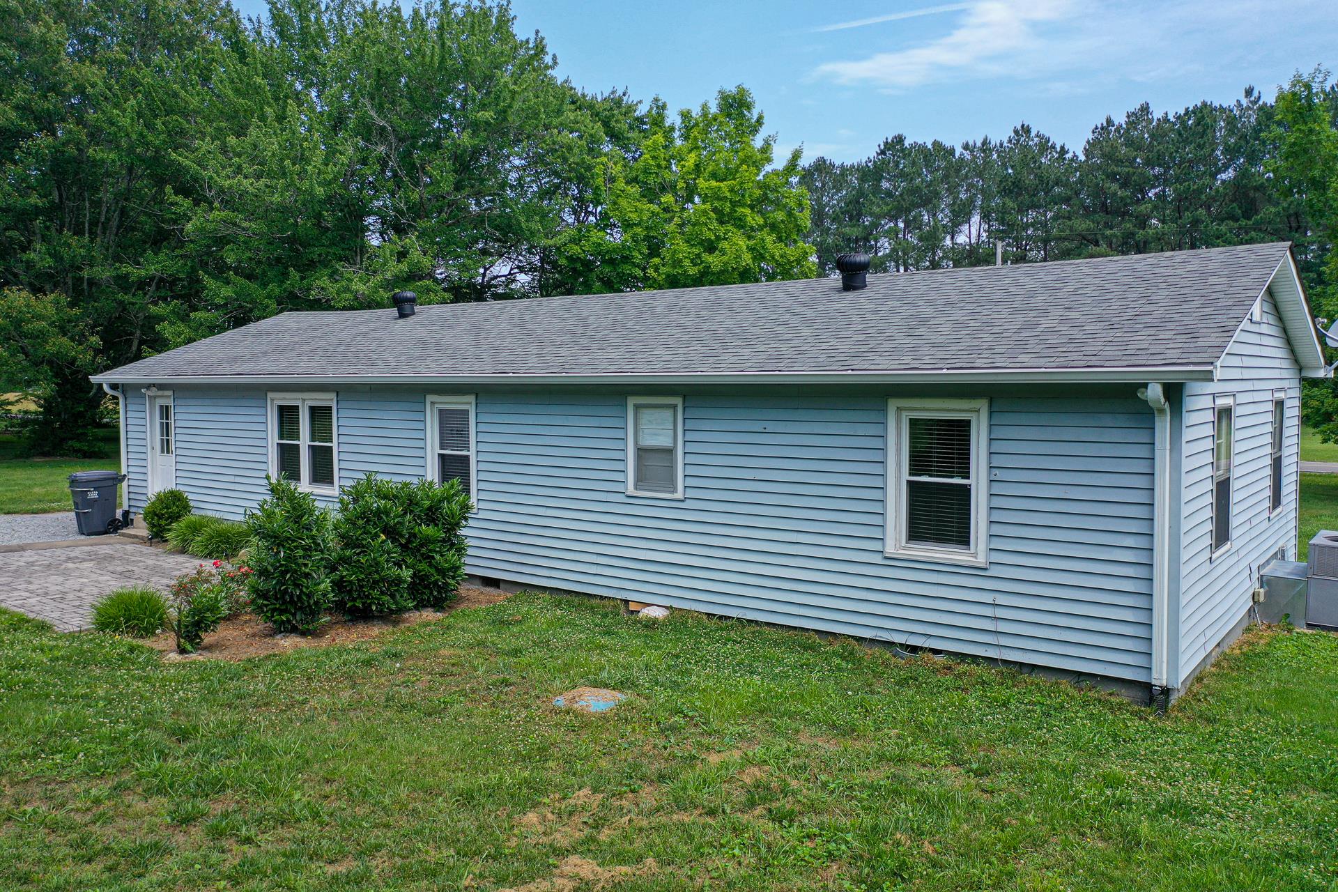 1236 Butler Bridge Road Portland, TN 37148 - Photo 19 of 22 a aerial view of a house next to a yard