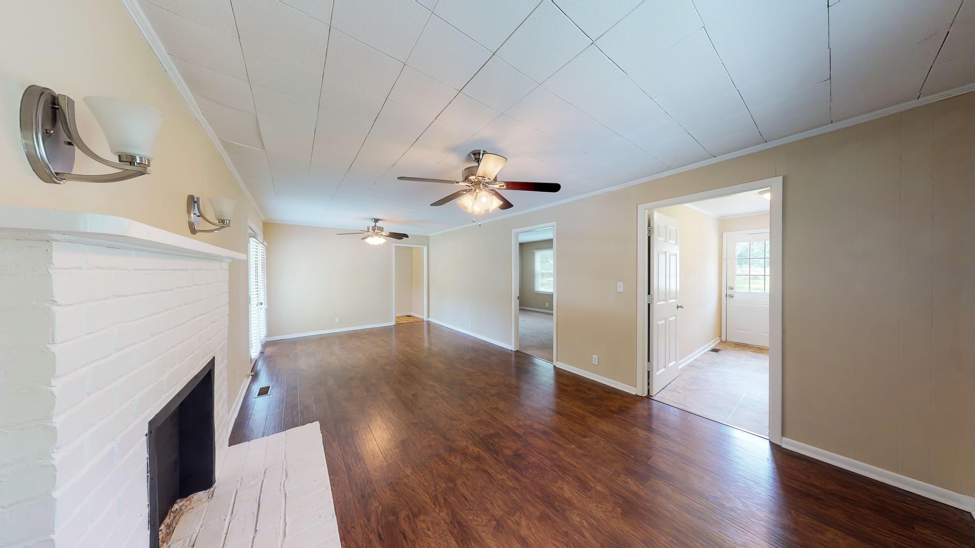 1236 Butler Bridge Road Portland, TN 37148 - Photo 9 of 22 a view of a livingroom with wooden floor