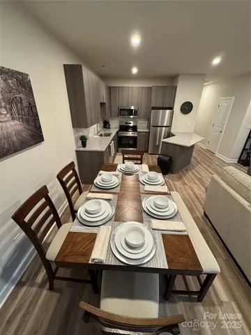 a view of a dining room with furniture