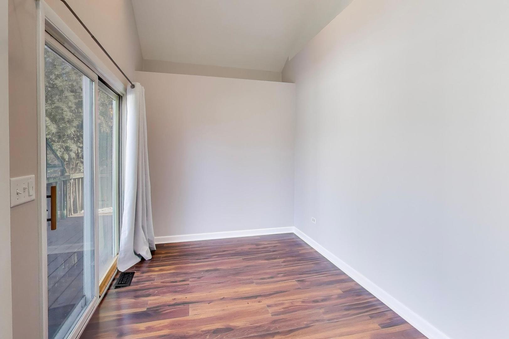 440 West Main Street Barrington, IL 60010 - Photo 16 of 32 a view of a hallway with wooden floor