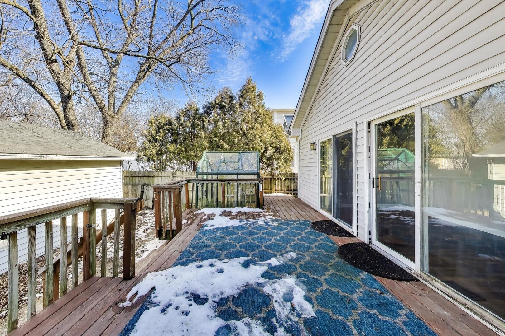 440 West Main Street Barrington, IL 60010 - Photo 27 of 32 a view of a house with a wooden deck