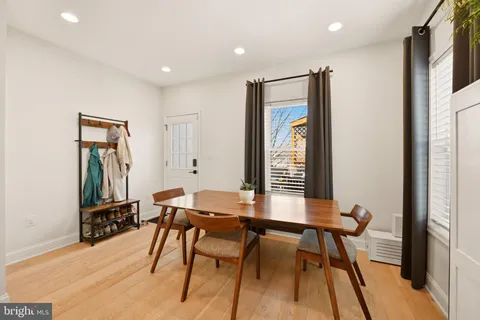a workspace with furniture and wooden floor