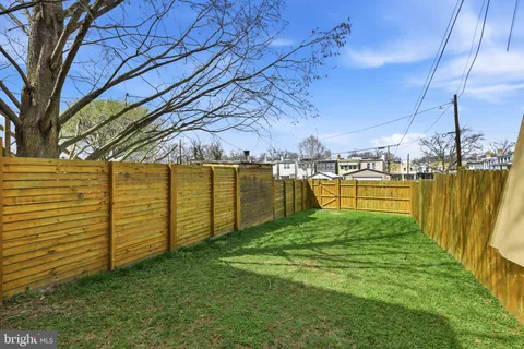 a view of a yard with an outdoor space