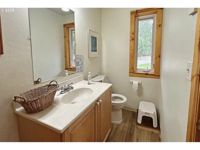 a view of a bench sitting in front of a building