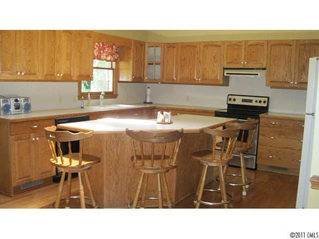 633 Marvin Road Indian Land, SC 29707 - Photo 5 of 16 a kitchen with a sink cabinets and window