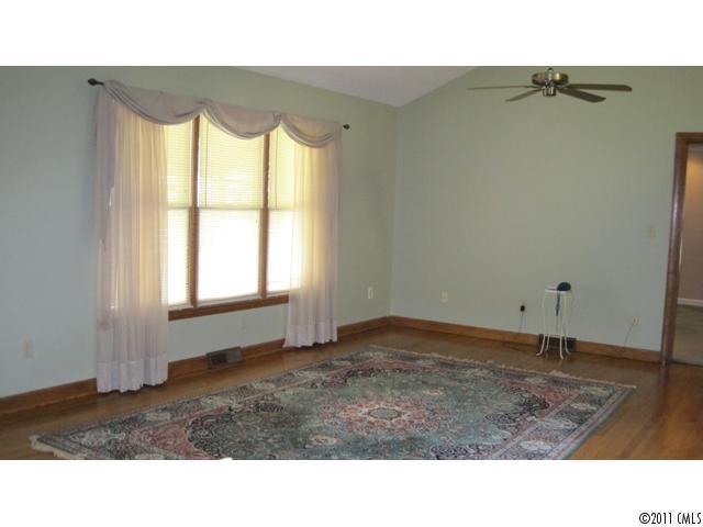 633 Marvin Road Indian Land, SC 29707 - Photo 9 of 16 a room with a bed and a window