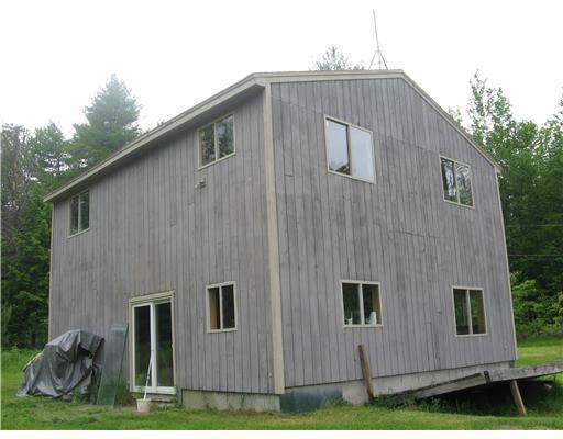 21 Peabody Pond Road Sebago, ME 04029 - Photo 2 of 10 Exterior Back. Back of home.