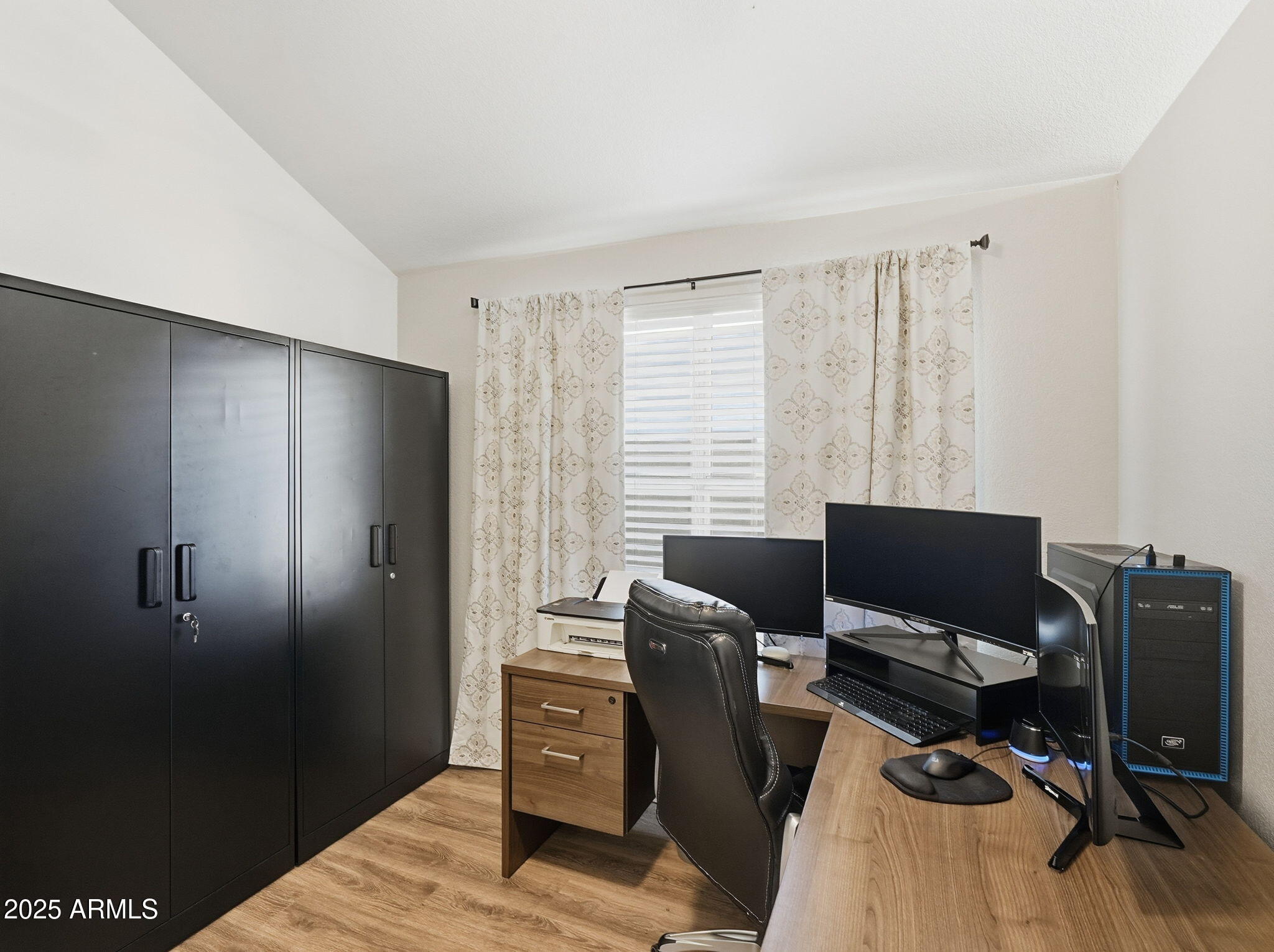 1516 East Cheyenne Street Gilbert, AZ 85296 - Photo 22 of 73 a view of a workspace with furniture and a window