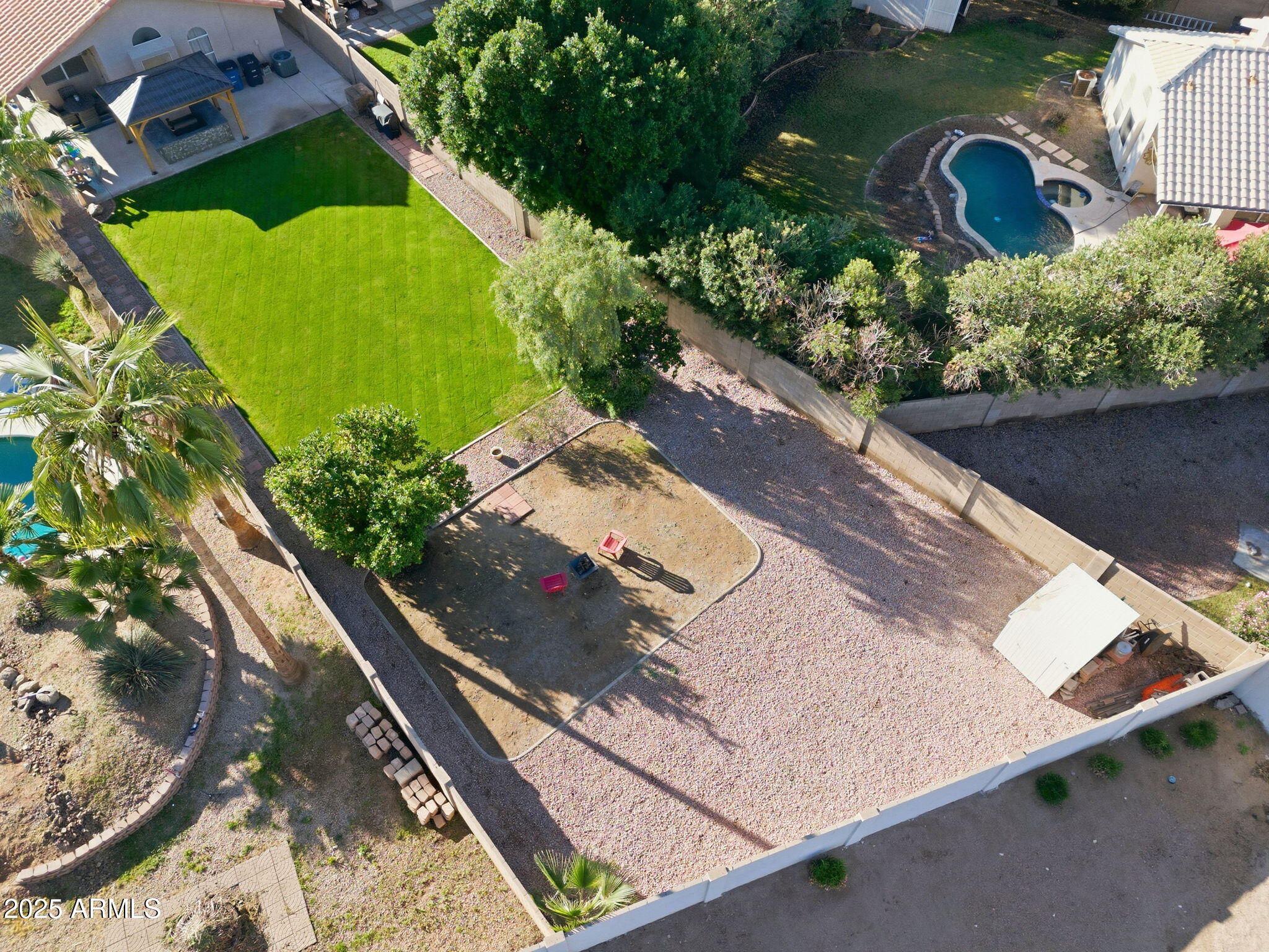 1516 East Cheyenne Street Gilbert, AZ 85296 - Photo 4 of 73 an aerial view of a house