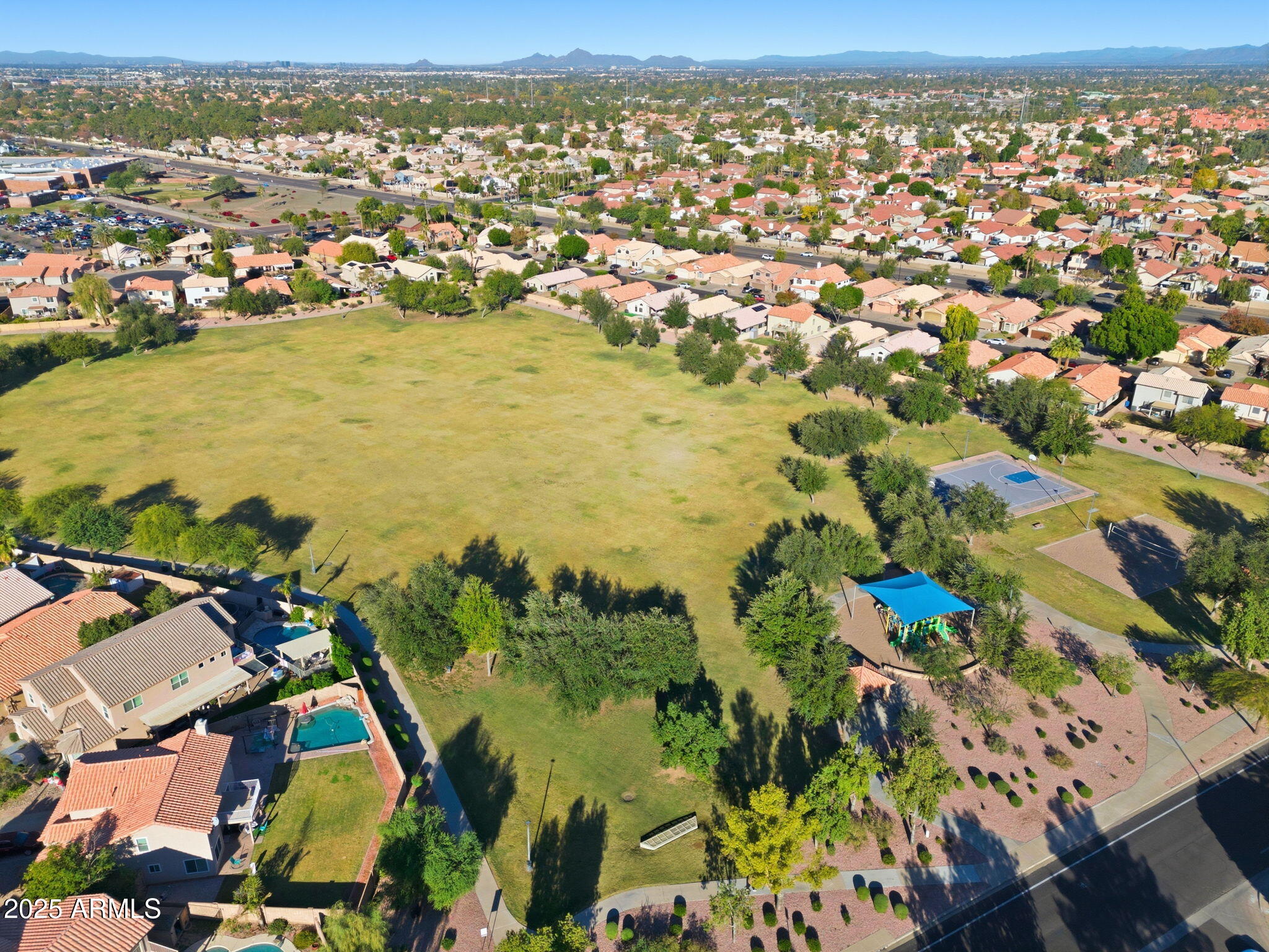 1516 East Cheyenne Street Gilbert, AZ 85296 - Photo 56 of 73 an aerial view of ocean and residential houses with outdoor space