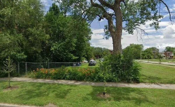 a view of outdoor space with deck and yard