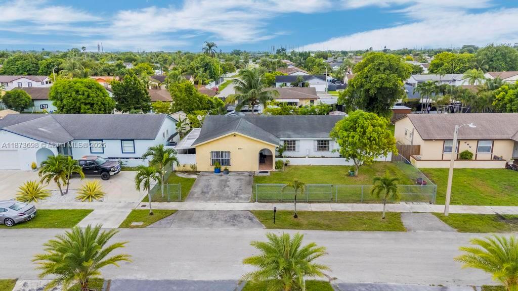 26023 Southwest 133rd Place Homestead, FL 33032 - Photo 3 of 39 an aerial view of a house