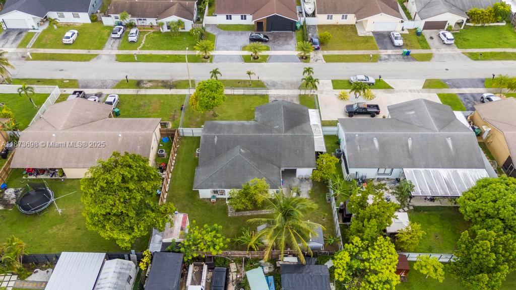 26023 Southwest 133rd Place Homestead, FL 33032 - Photo 37 of 39 a aerial view of a house with a garden