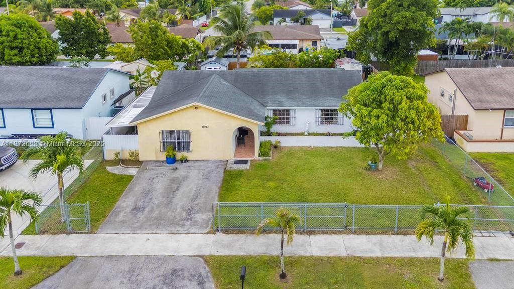 26023 Southwest 133rd Place Homestead, FL 33032 - Photo 4 of 39 an aerial view of a house with swimming pool