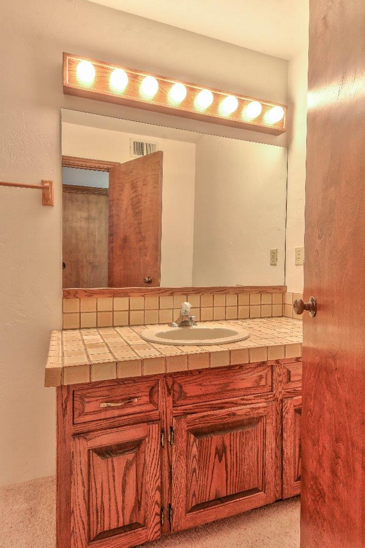 96 Robley Road Salinas, CA 93908 - Photo 36 of 41 a bathroom with a sink and a mirror