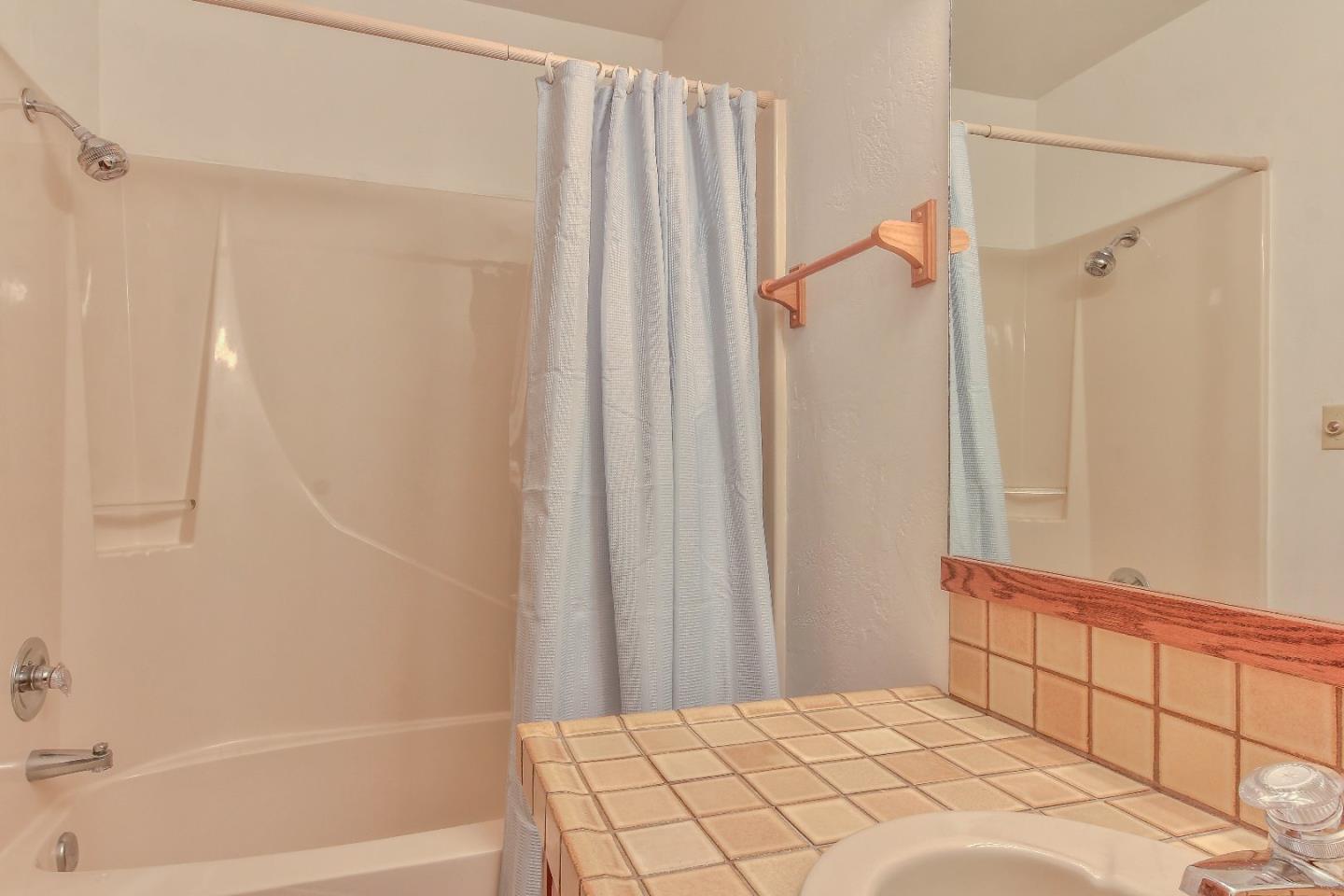 96 Robley Road Salinas, CA 93908 - Photo 37 of 41 a bathroom with a shower and a tub