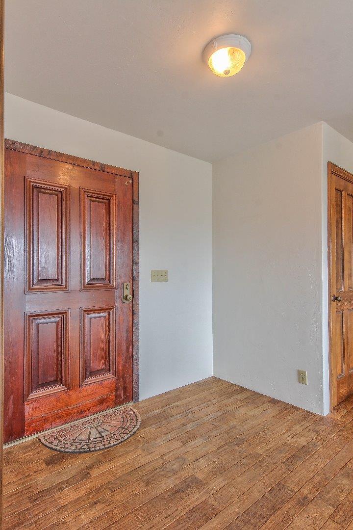 96 Robley Road Salinas, CA 93908 - Photo 5 of 41 a view of empty room with wooden floor
