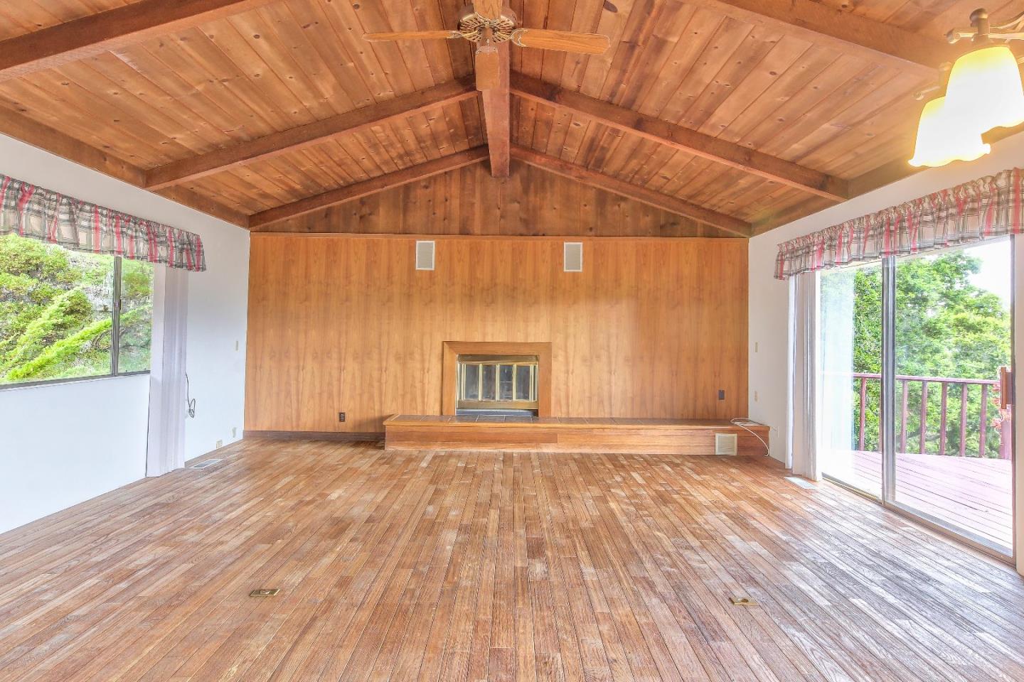 96 Robley Road Salinas, CA 93908 - Photo 6 of 41 a view of an empty room with wooden floor and a window
