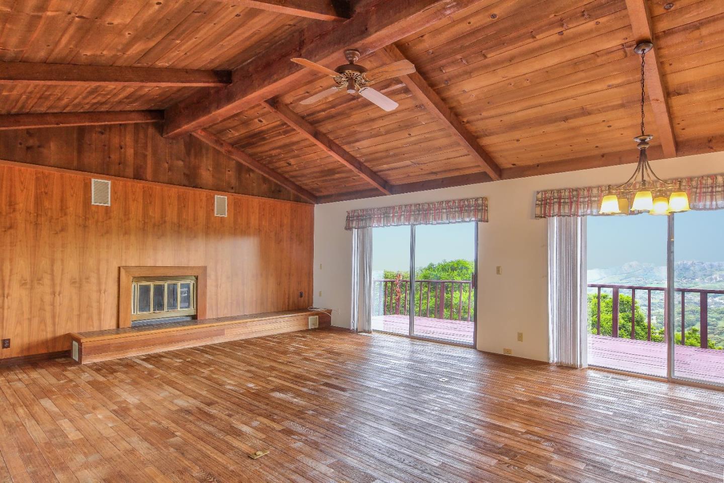 96 Robley Road Salinas, CA 93908 - Photo 7 of 41 a view of an empty room with wooden floor and a window