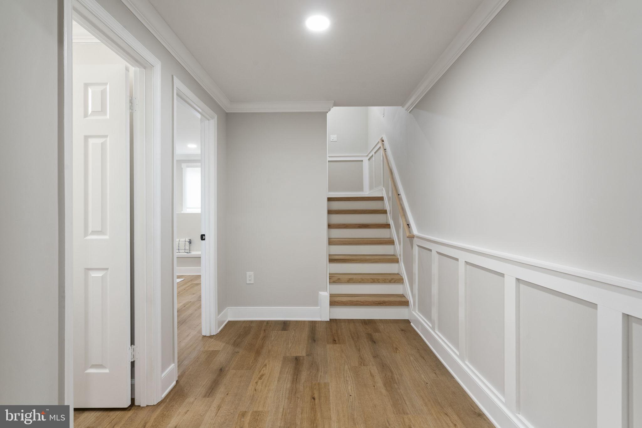 2891 Kelly Square Vienna, VA 22181 - Photo 17 of 39 a view of entryway with wooden floor