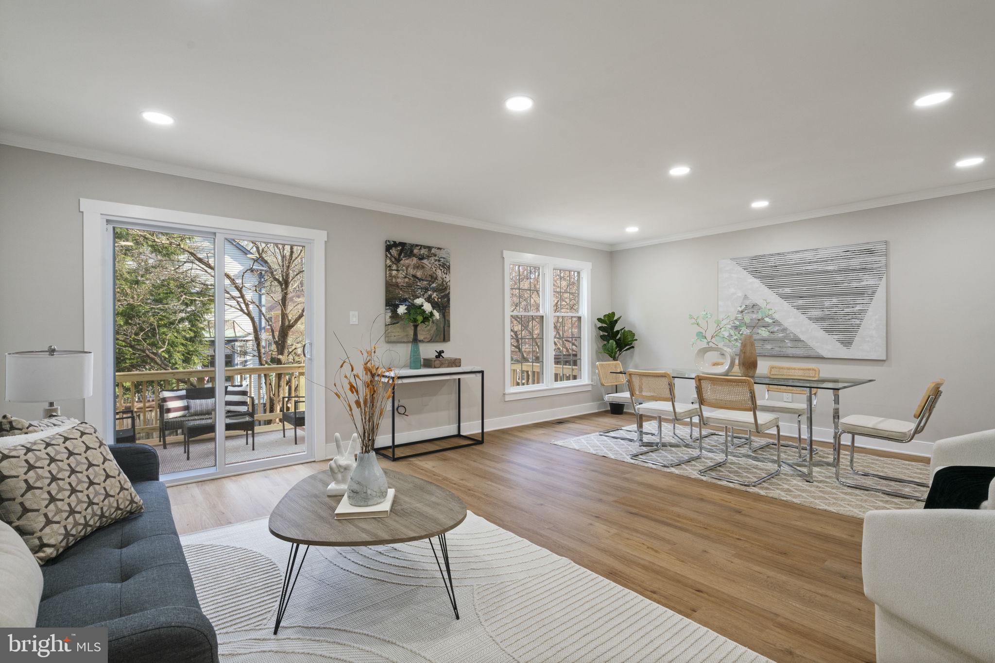 2891 Kelly Square Vienna, VA 22181 - Photo 2 of 39 a living room with furniture and a potted plant