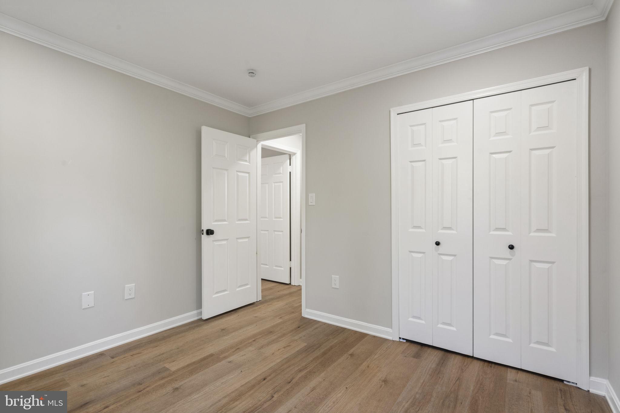 2891 Kelly Square Vienna, VA 22181 - Photo 23 of 39 a view of an empty room and wooden floor