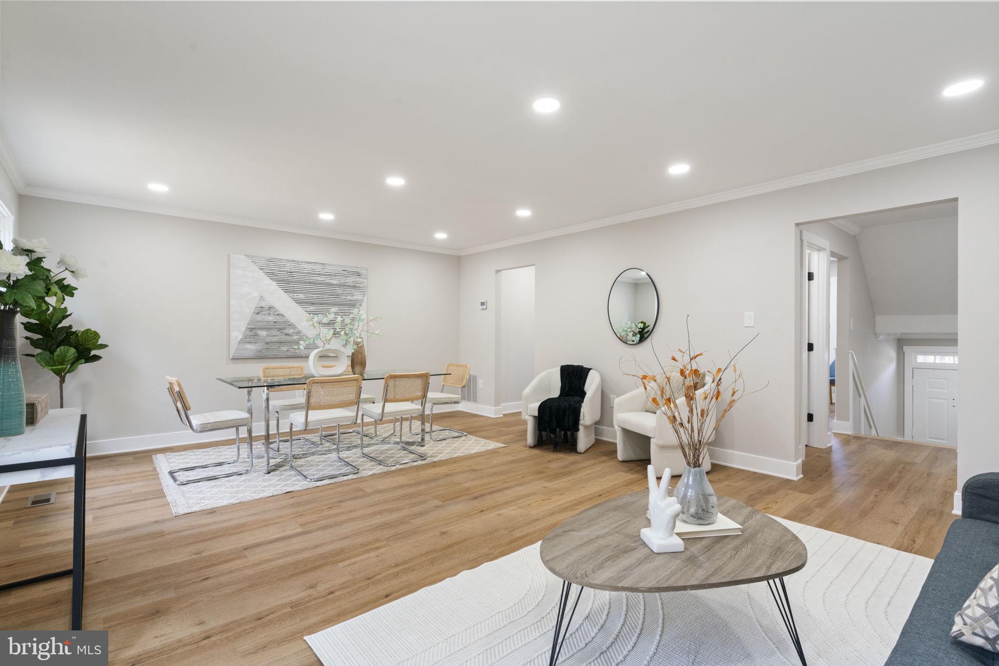 2891 Kelly Square Vienna, VA 22181 - Photo 3 of 39 a living room with furniture and a table