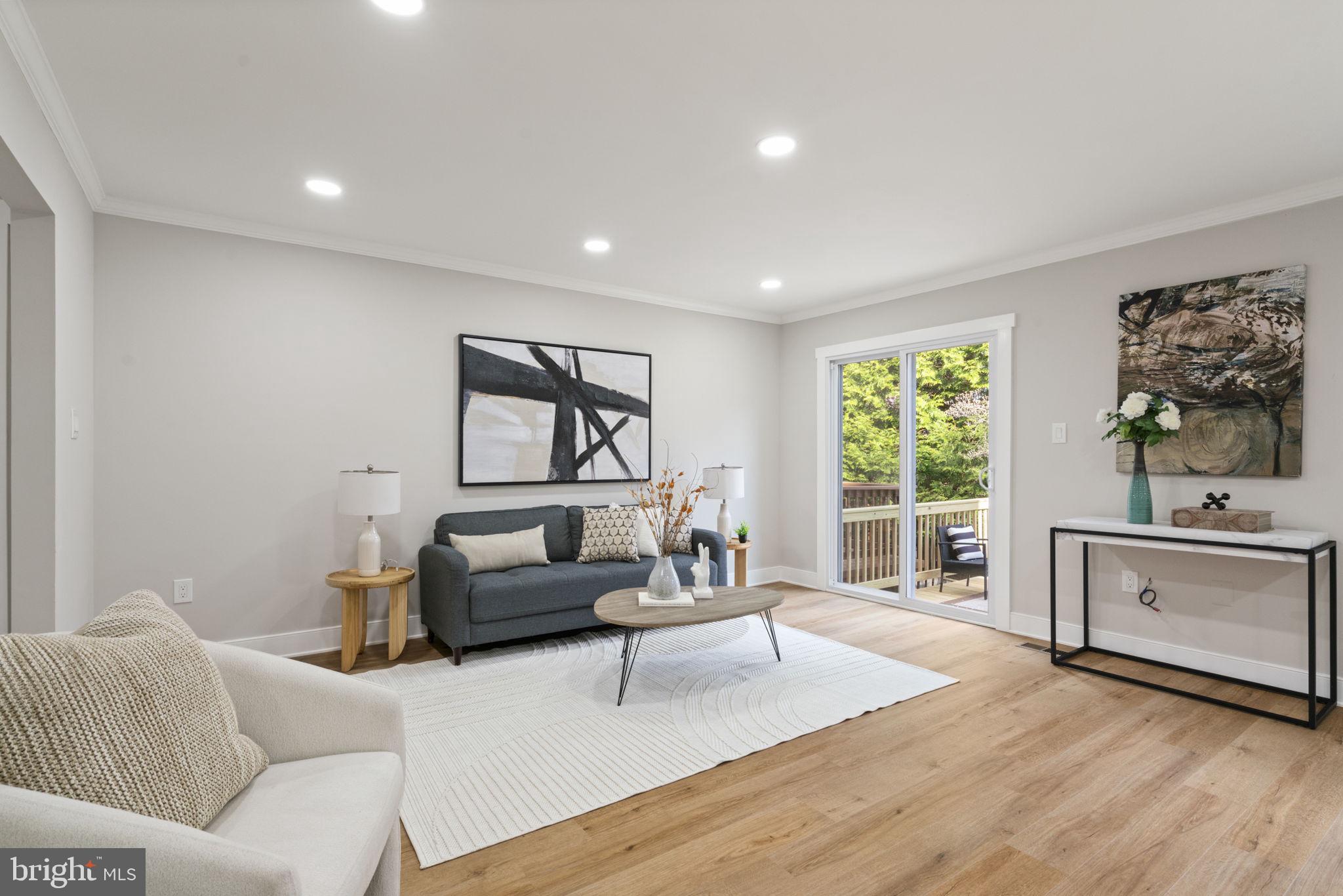 2891 Kelly Square Vienna, VA 22181 - Photo 4 of 39 a living room with furniture and a large window
