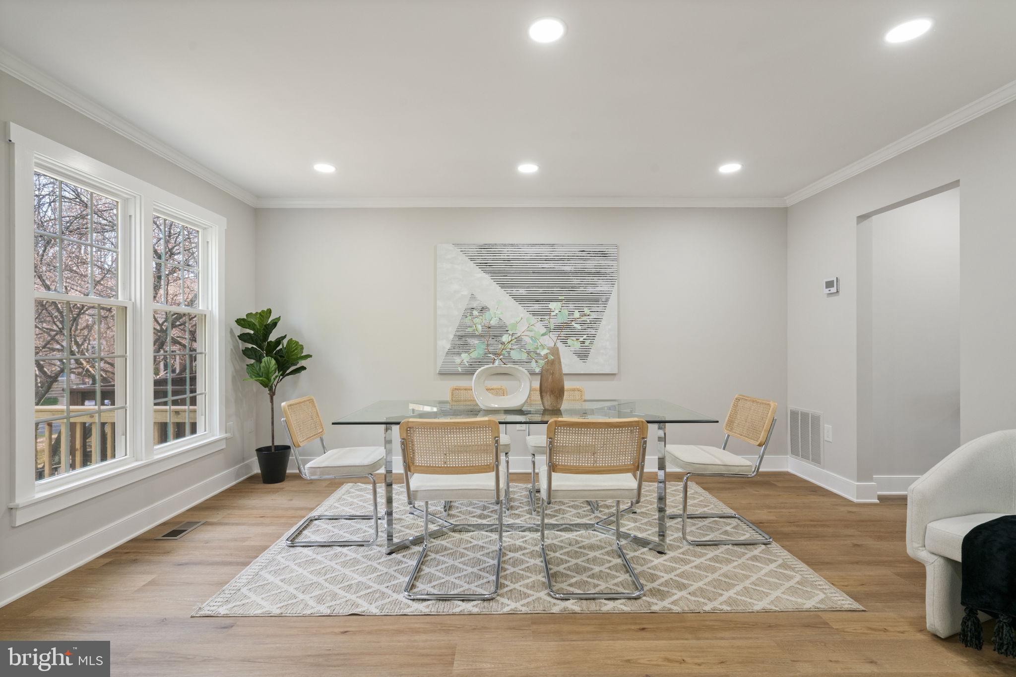 2891 Kelly Square Vienna, VA 22181 - Photo 5 of 39 a living room with furniture and a wooden floor