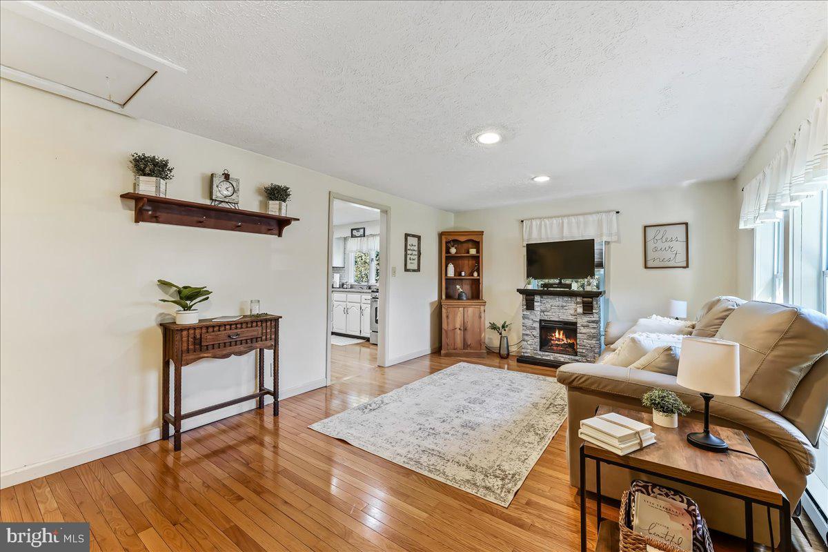 51 Carter Road Rising Sun, MD 21911 - Photo 2 of 17 a living room with furniture and a flat screen tv