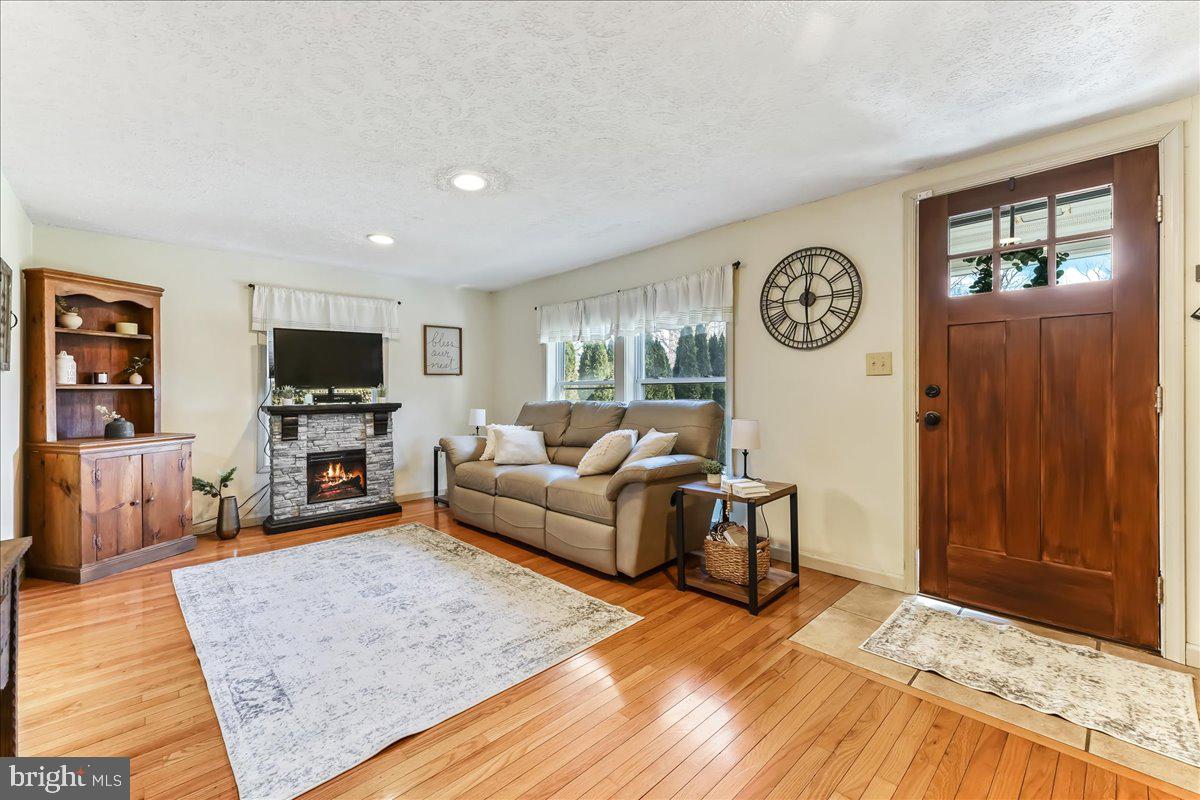 51 Carter Road Rising Sun, MD 21911 - Photo 3 of 17 a living room with furniture and a flat screen tv