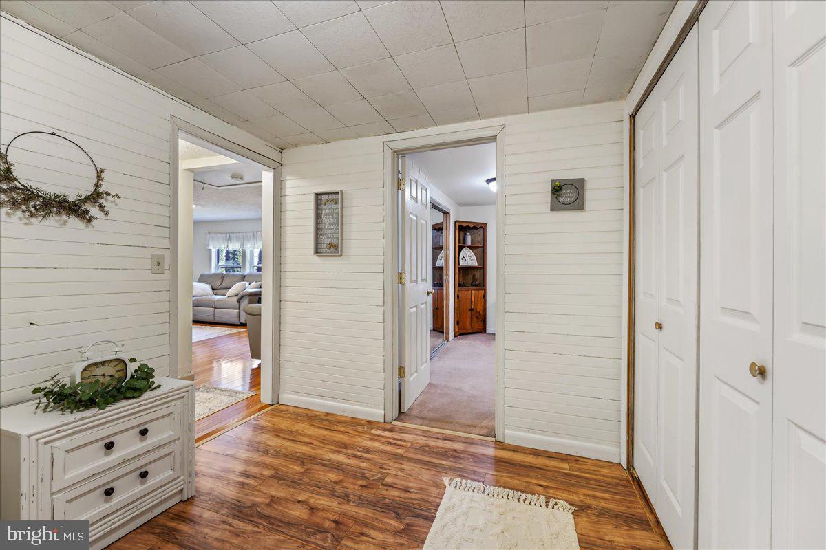 51 Carter Road Rising Sun, MD 21911 - Photo 9 of 17 a view of hallway with window and wooden floor