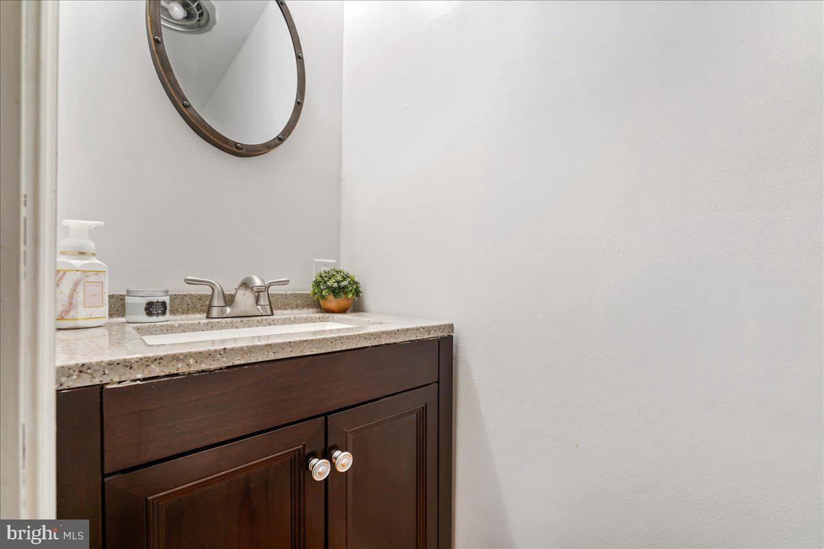 51 Carter Road Rising Sun, MD 21911 - Photo 10 of 17 a bathroom with a sink and a mirror